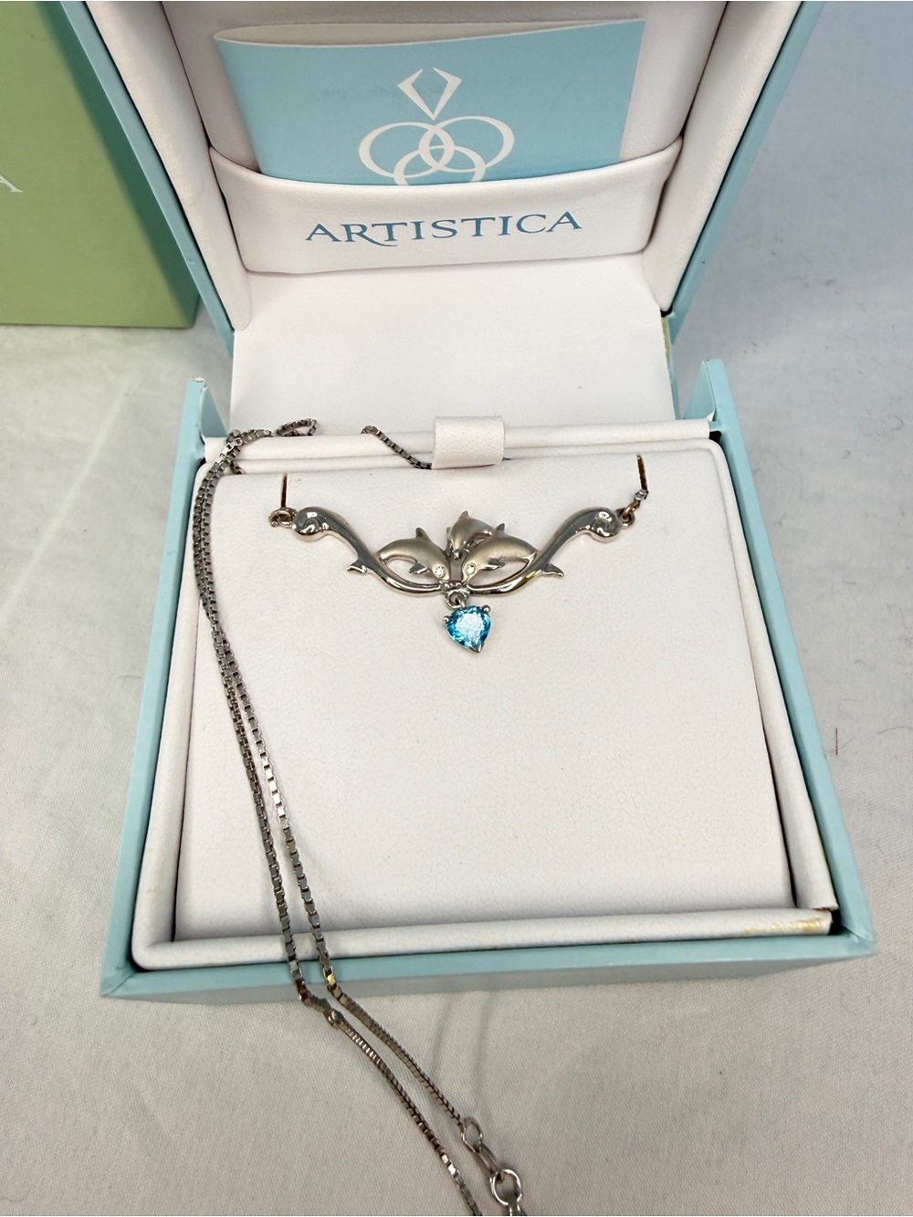Artistica-Sterling Silver Necklace w/ Blue Heart Topaz & Dolphins w/Diamond eyes